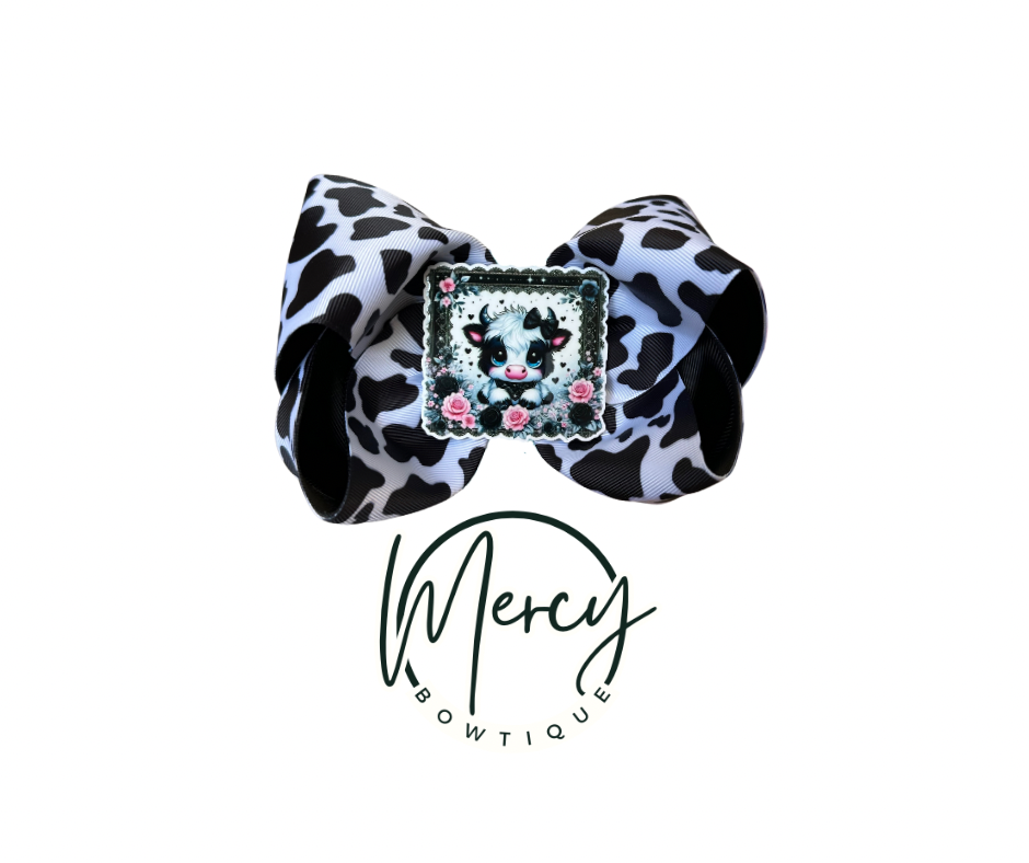 6” COW PRINT BOWTIQUE🐄🖤